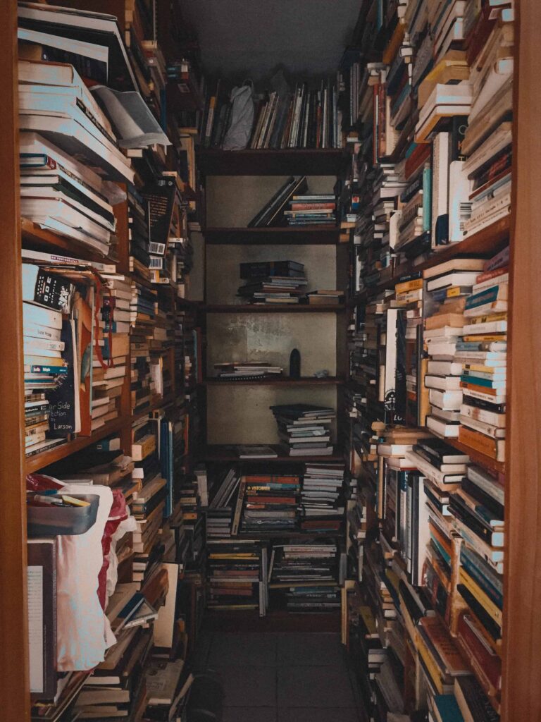 narrow stacks of books